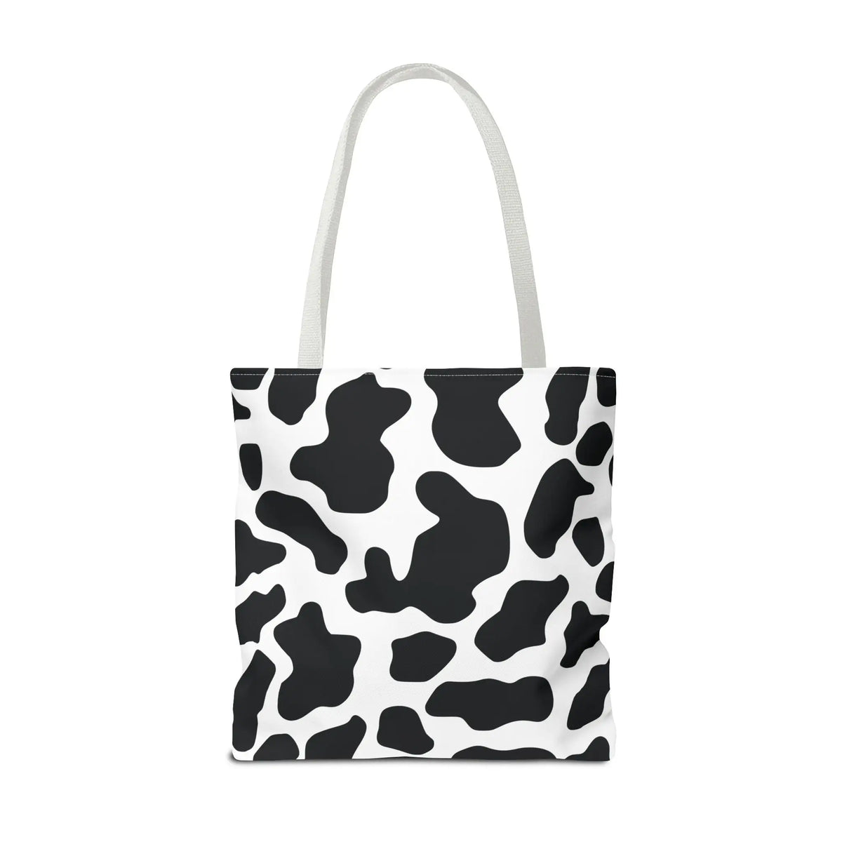 Large black and white cow print tote bag with matching handles reusable for shopping and travel use