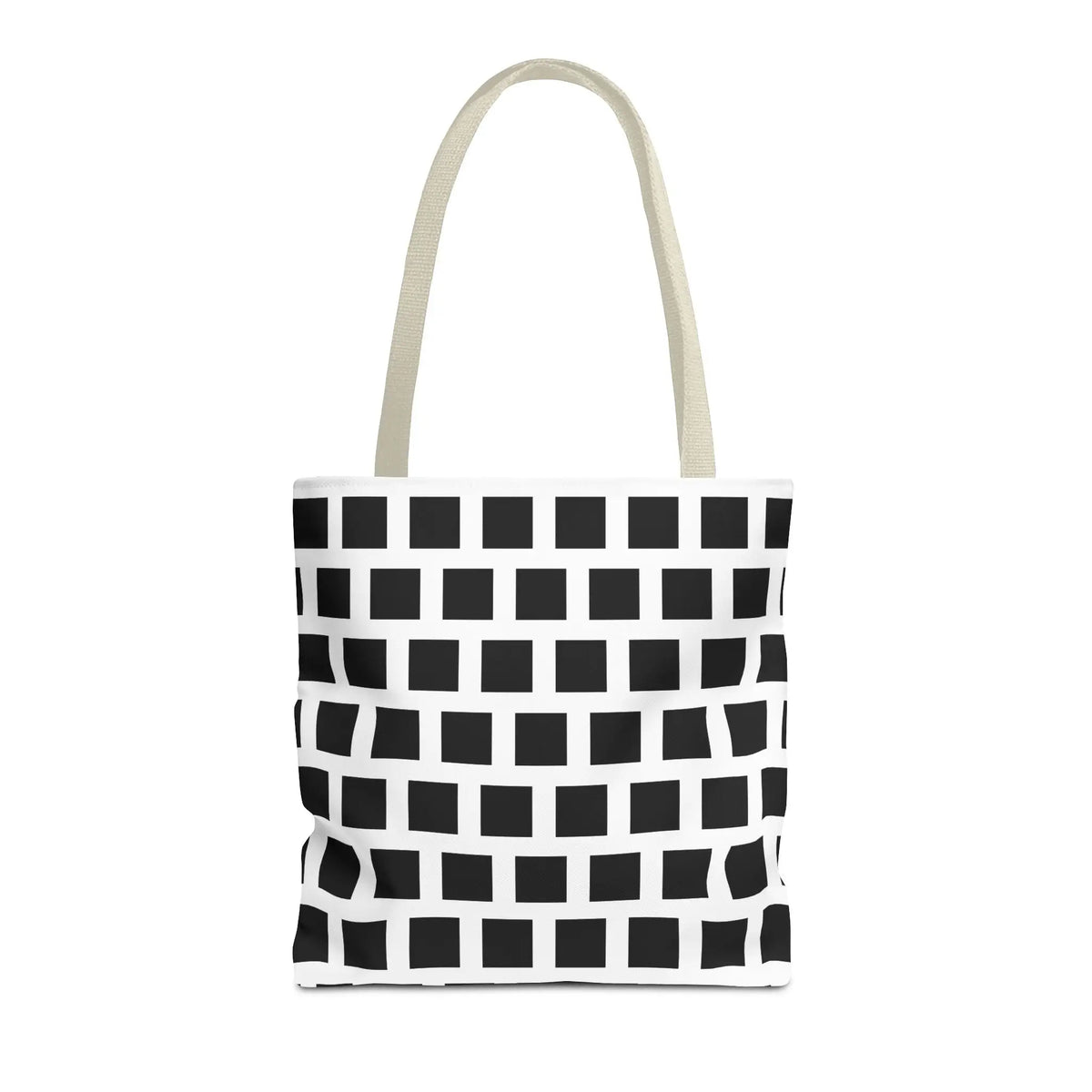 White canvas tote bag with black square pattern and cream-colored handles for versatile durable use
