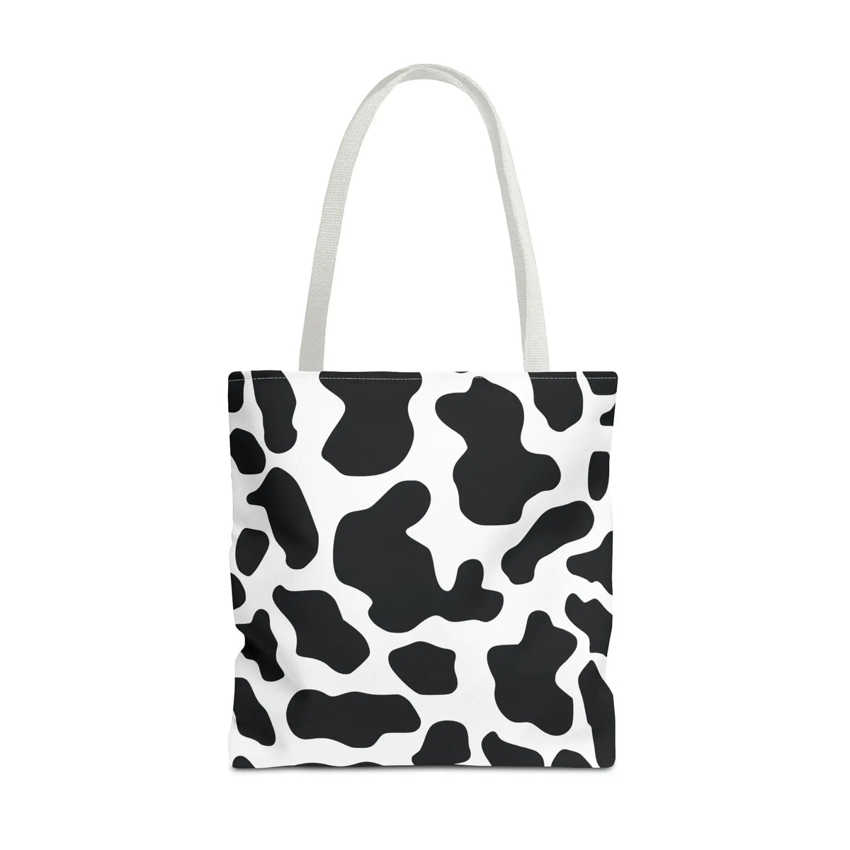 Black and white cow print canvas tote bag with matching handles large reusable cow print tote for shopping and travel