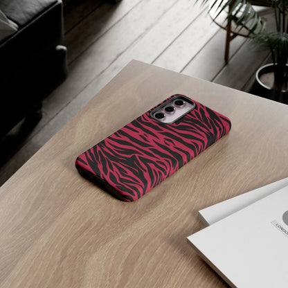 Back side of a magenta wild tiger pattern print phone case with vibrant pink and black zebra-striped glossy finish