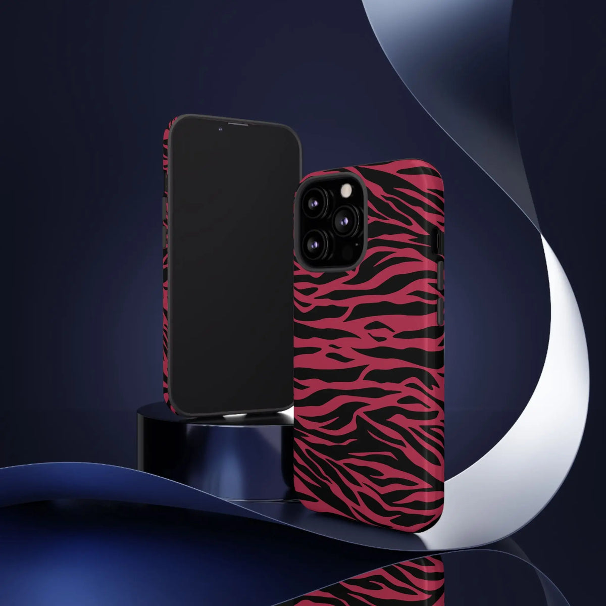 Magenta wild tiger pattern print phone case with a vibrant pink and black zebra striped back and sleek protective design